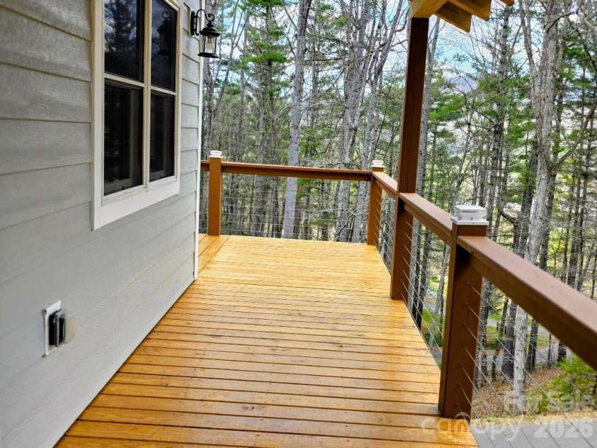 22 Salt Box Haven, Burnsville, NC 28714.  MLS# CAR4364362, YatesRealty ID 16043. Deck in the front of the house