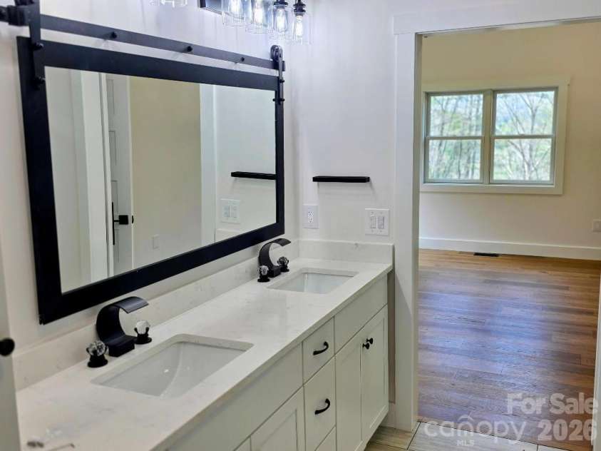 22 Salt Box Haven, Burnsville, NC 28714.  MLS# CAR4364362, YatesRealty ID 16043. Ensuite bathroom with dual sinks