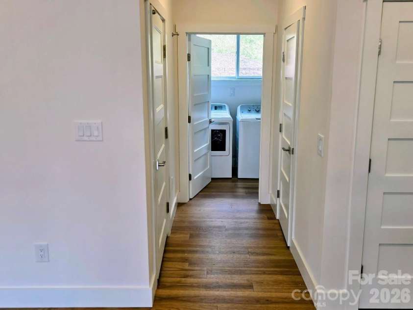 22 Salt Box Haven, Burnsville, NC 28714.  MLS# CAR4364362, YatesRealty ID 16043. Hallway from the kitchen to the laundry