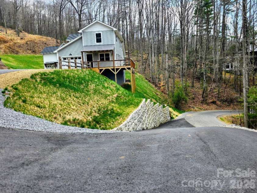 22 Salt Box Haven, Burnsville, NC 28714.  MLS# CAR4364362, YatesRealty ID 16043. Looking down Saltbox Haven to Reservoir Road
