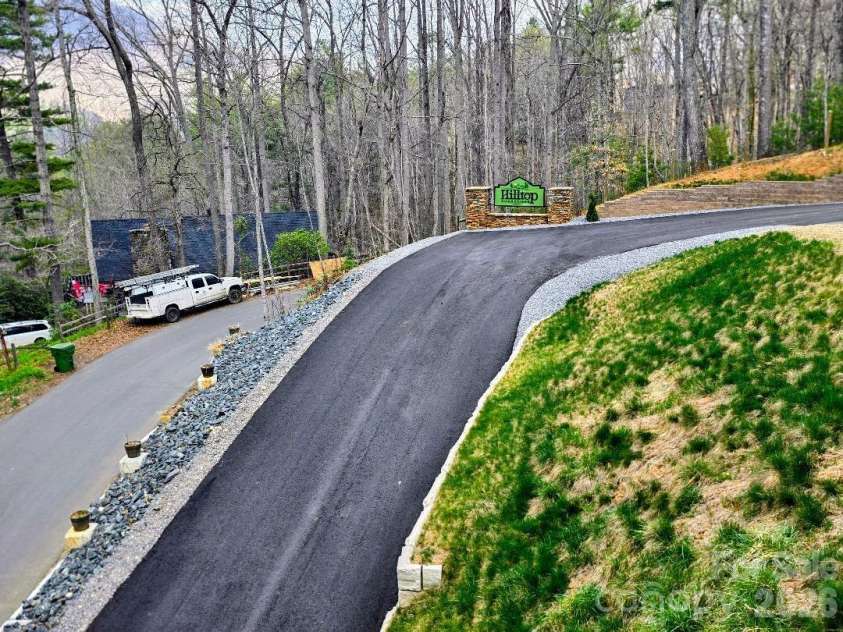 22 Salt Box Haven, Burnsville, NC 28714.  MLS# CAR4364362, YatesRealty ID 16043. Looking from the deck to the development entrance