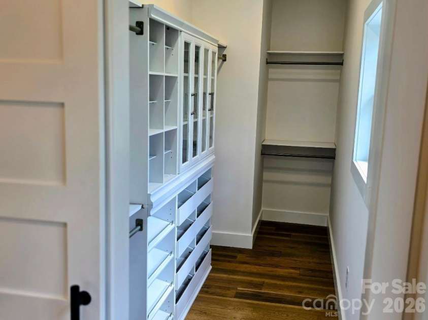 22 Salt Box Haven, Burnsville, NC 28714.  MLS# CAR4364362, YatesRealty ID 16043. Primary bedroom walk-in closet