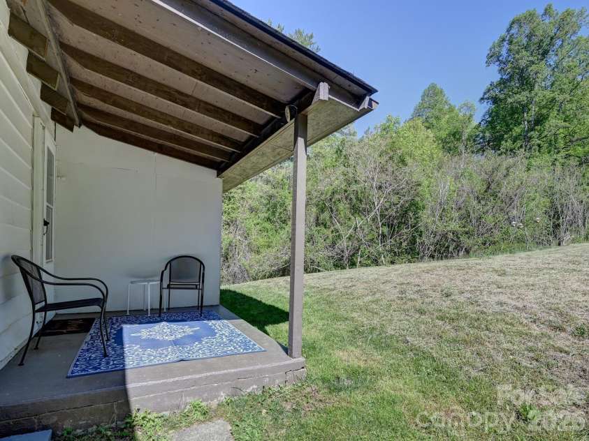 623 School Road, Asheville, NC 28803.  MLS# CAR4365936, YatesRealty ID 16044. Back Patio