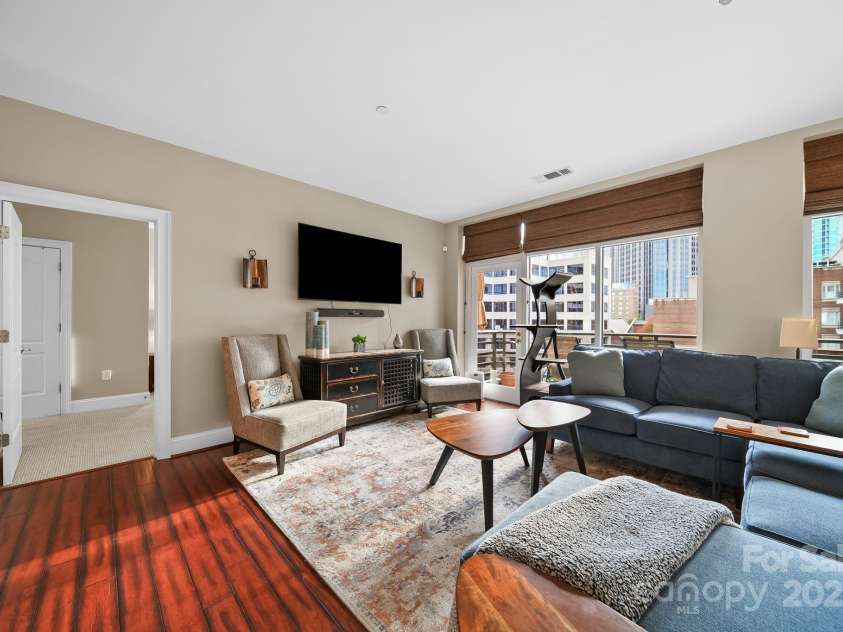 400 Church Street, Charlotte, NC 28202.  MLS# CAR4325886, YatesRealty ID 16045. Living room 3