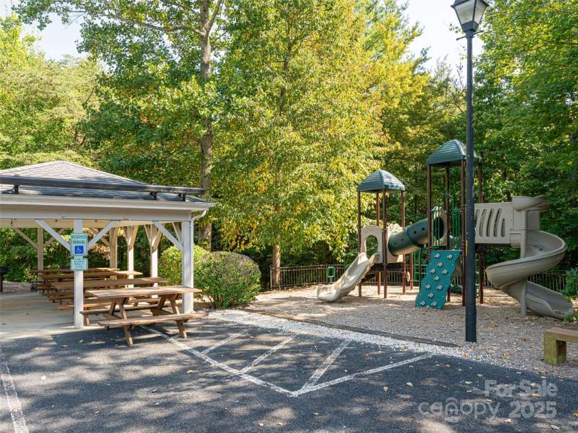 737 Streamside Drive, Arden, NC 28704.  MLS# CAR4248718, YatesRealty ID 16049. Community playground, barbecue and picnic area