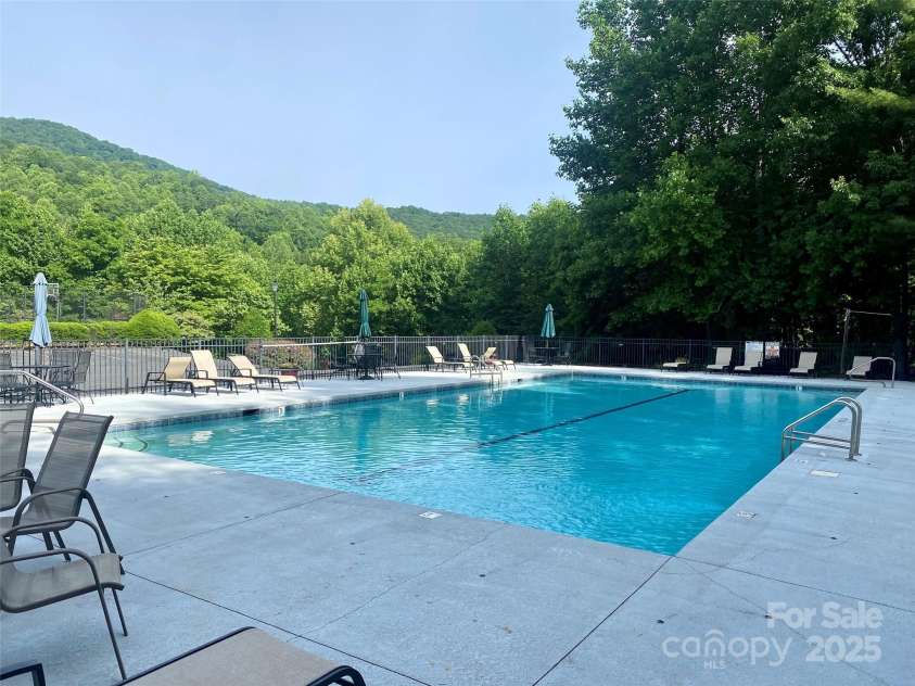 737 Streamside Drive, Arden, NC 28704.  MLS# CAR4248718, YatesRealty ID 16049. Enjoy the mountain views from the community pool