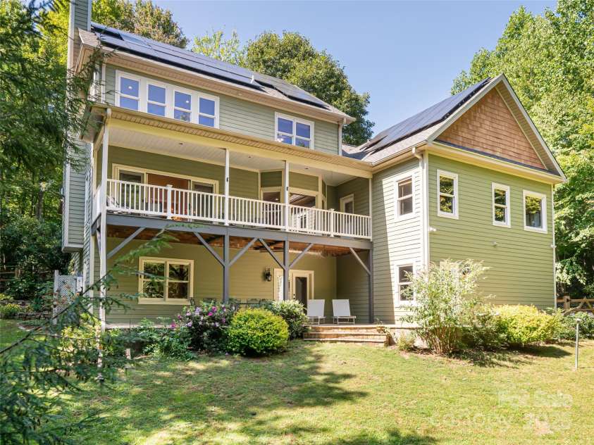 737 Streamside Drive, Arden, NC 28704.  MLS# CAR4248718, YatesRealty ID 16049. The lower patio is a great place to sun