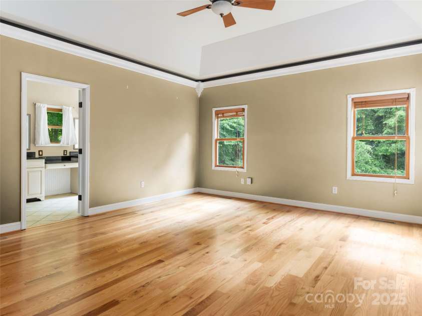 737 Streamside Drive, Arden, NC 28704.  MLS# CAR4248718, YatesRealty ID 16049. The primary suite with large walk-in closet