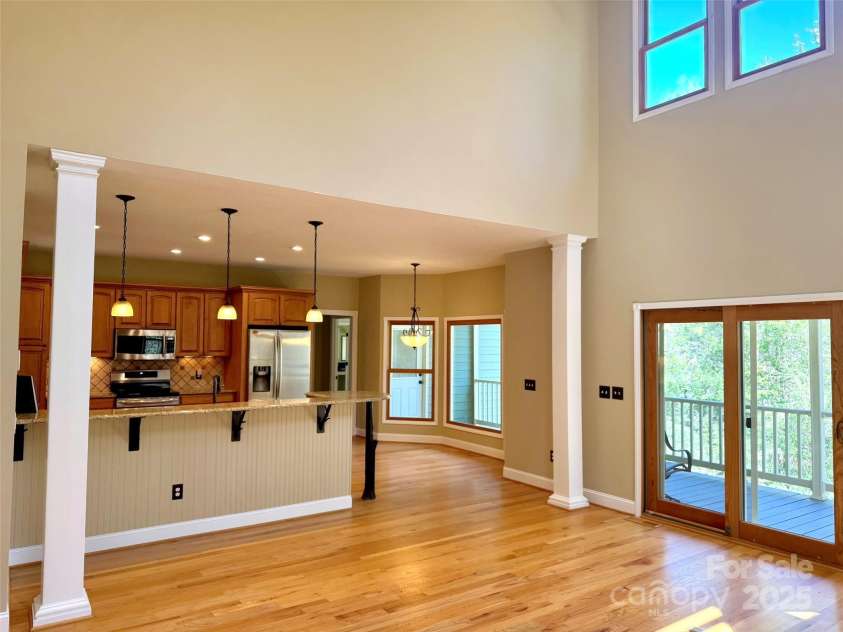 737 Streamside Drive, Arden, NC 28704.  MLS# CAR4248718, YatesRealty ID 16049. There is plenty of room to seat friends and family at the 18 ft breakfast bar