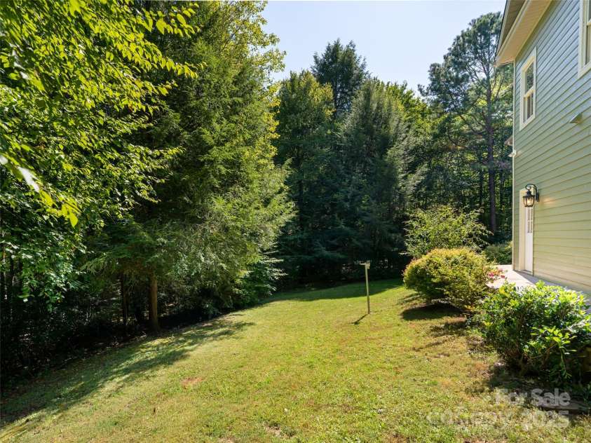 737 Streamside Drive, Arden, NC 28704.  MLS# CAR4248718, YatesRealty ID 16049. There is plenty of yard space to run and play