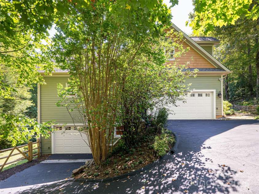 737 Streamside Drive, Arden, NC 28704.  MLS# CAR4248718, YatesRealty ID 16049. Upper and lower garages
