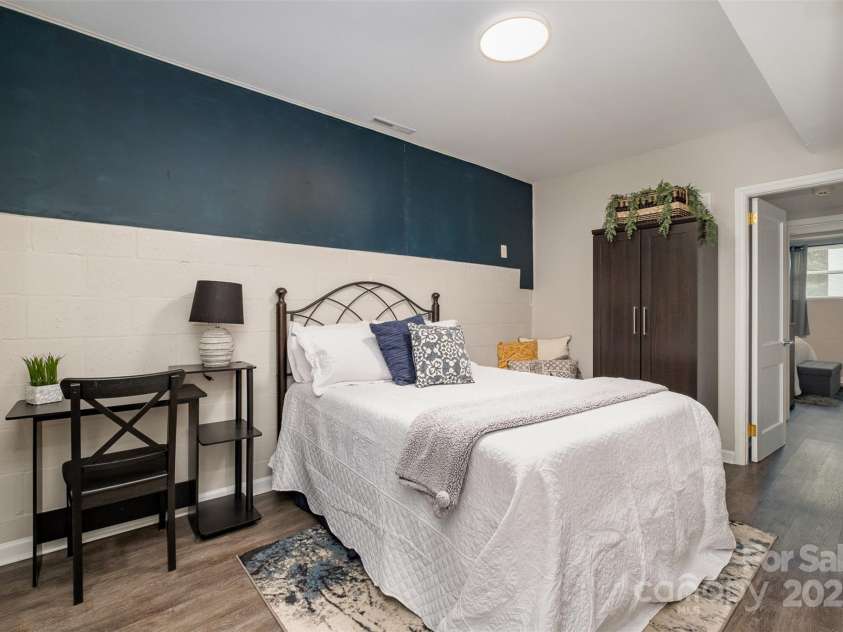 3231 Eastwood Drive, Charlotte, NC 28205.  MLS# CAR4228945, YatesRealty ID 16051. Flex room in basement positioned as a bedroom