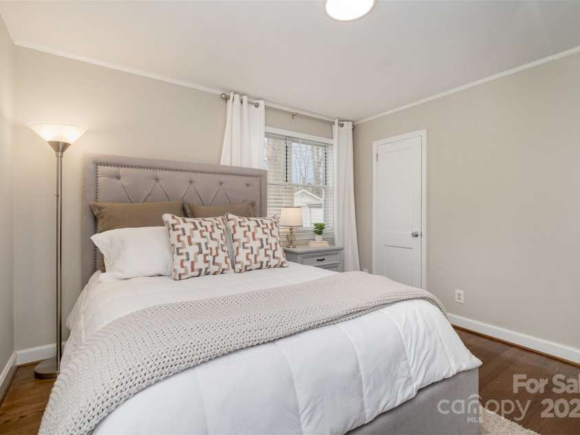 3231 Eastwood Drive, Charlotte, NC 28205.  MLS# CAR4228945, YatesRealty ID 16051. Natural light & warm wood floors for ultimate relaxation