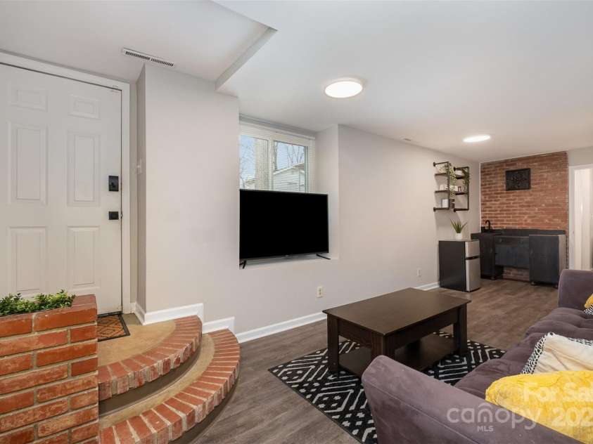 3231 Eastwood Drive, Charlotte, NC 28205.  MLS# CAR4228945, YatesRealty ID 16051. Separate-entry basement with a kitchenette, ideal for guests or extra income.