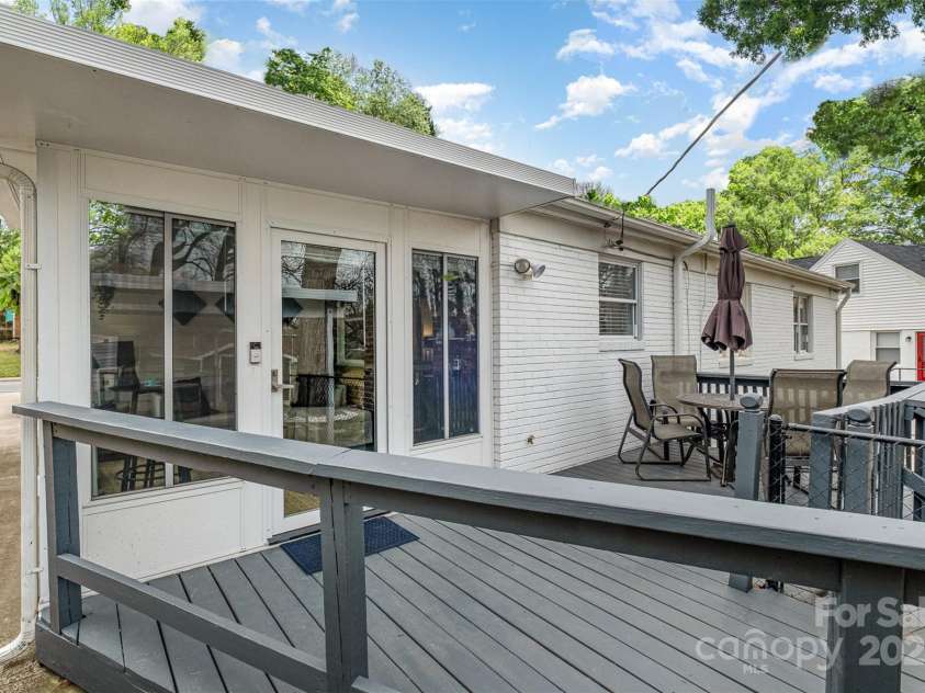 3231 Eastwood Drive, Charlotte, NC 28205.  MLS# CAR4228945, YatesRealty ID 16051. Spacious deck off of the sunroom