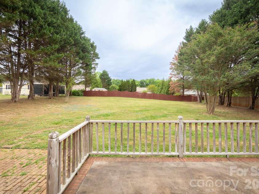 3971 Rolling Meadow Lane, Lincolnton, NC 28092.  MLS# CAR4373846, YatesRealty ID 16055. Relax on your back deck