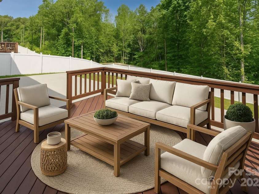 424 Preston Road, Mooresville, NC 28117.  MLS# CAR4252036, YatesRealty ID 16055. AI staged deck area