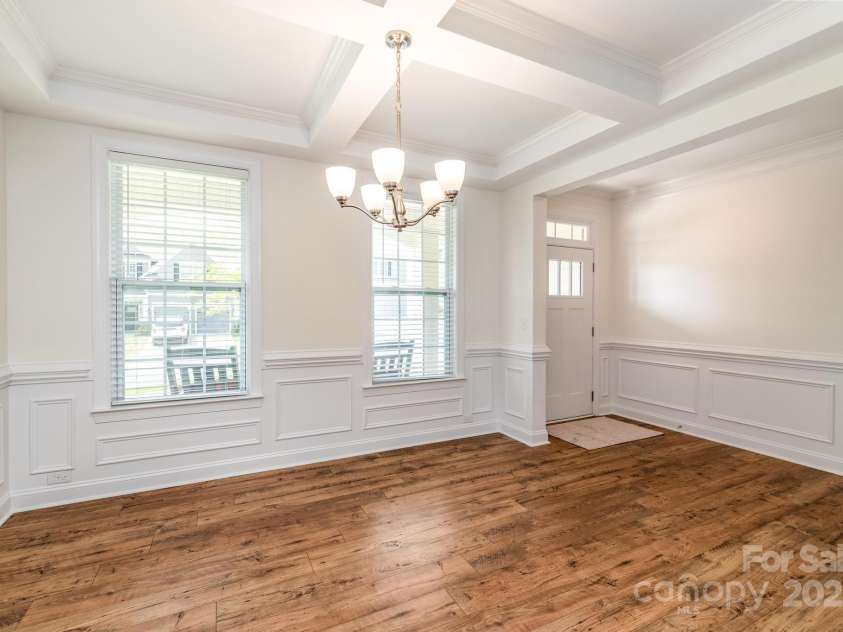 424 Preston Road, Mooresville, NC 28117.  MLS# CAR4252036, YatesRealty ID 16055. Coffered ceiling in dining room