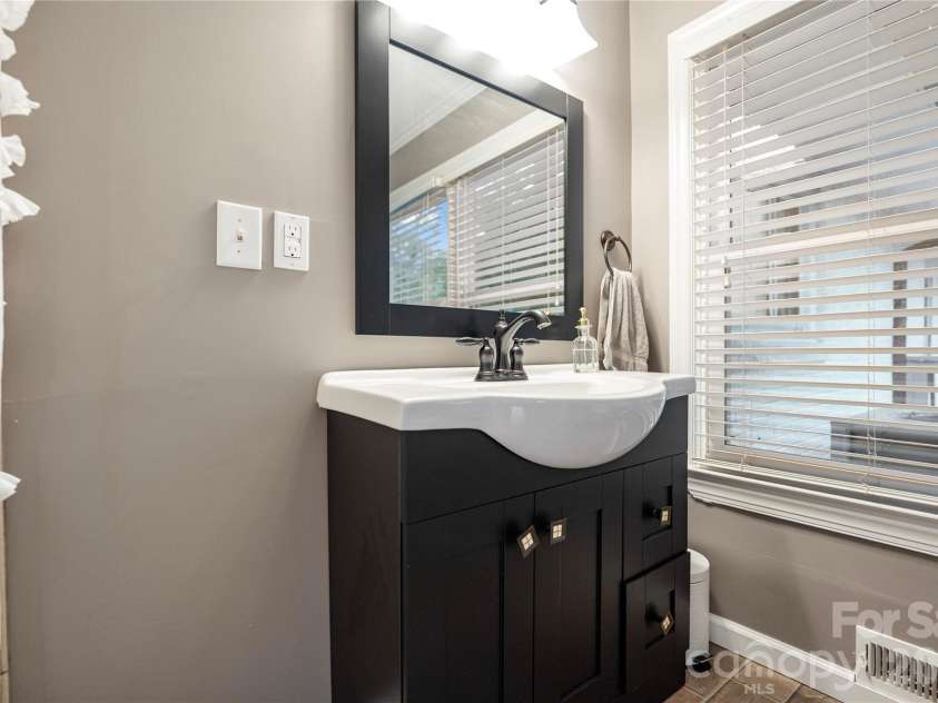 2524 Griffith Road, Monroe, NC 28112.  MLS# CAR4420258, YatesRealty ID 16059. Bathroom off Sunroom
