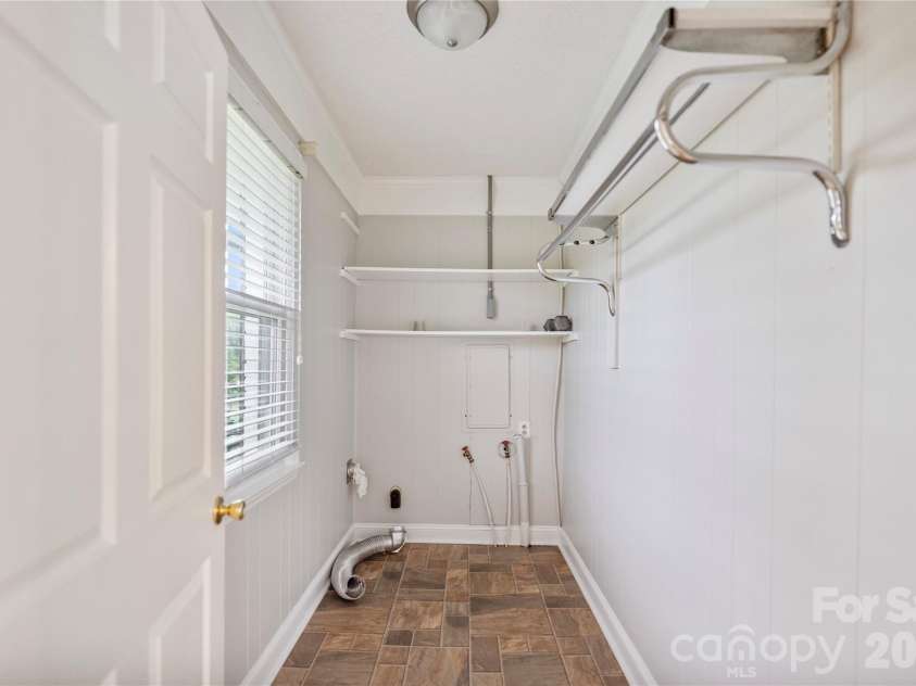 2524 Griffith Road, Monroe, NC 28112.  MLS# CAR4420258, YatesRealty ID 16059. Second Laundry Connections off the Family Room.