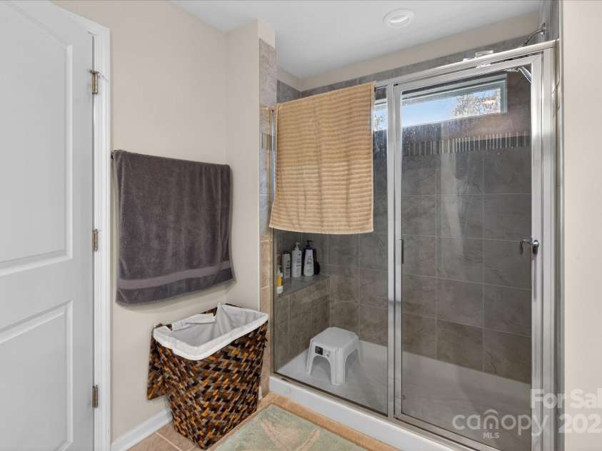 13017 Cinnamon Fern Lane, Mint Hill, NC 28227.  MLS# CAR4330864, YatesRealty ID 1606. Primary Walking Shower