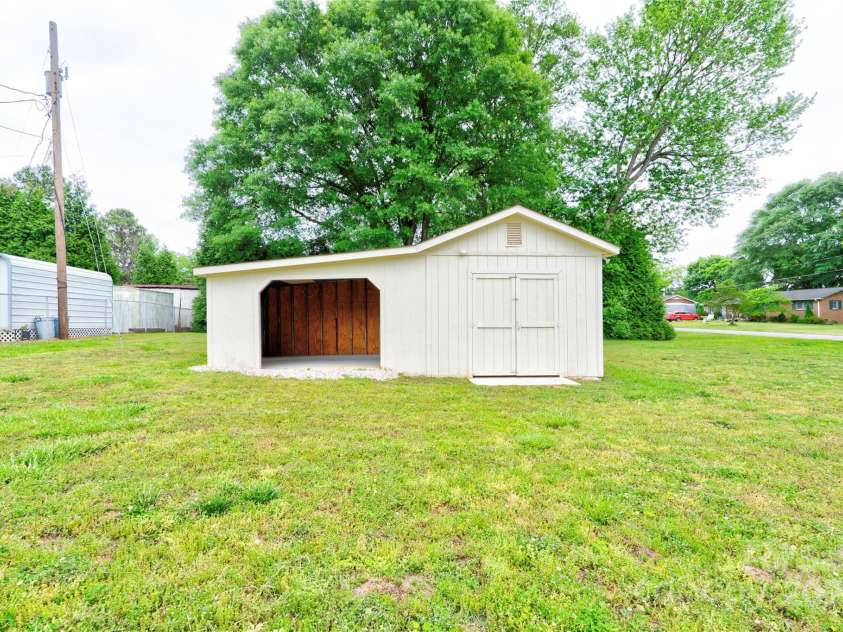 1690 Montevista Drive, Shelby, NC 28150.  MLS# CAR4256275, YatesRealty ID 16062. Storage Building w/Carport