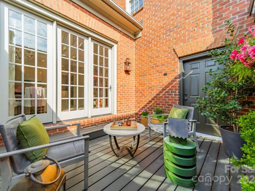 1801 Maryland Avenue, Charlotte, NC 28209.  MLS# CAR4235265, YatesRealty ID 16069. Patio off kitchen