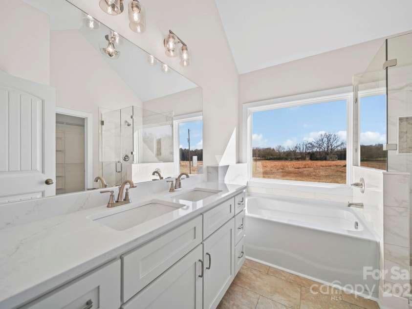 4106 New Salem Road, Marshville, NC 28103.  MLS# CAR4331810, YatesRealty ID 1607. Primary Bathroom