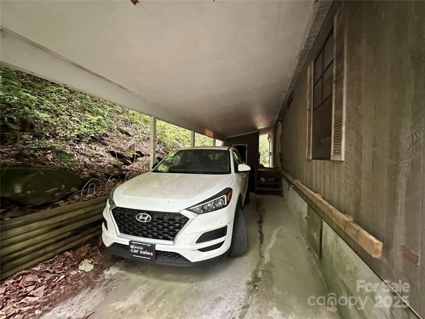 98 Long Pine Drive, Mills River, NC 28759.  MLS# CAR4264413, YatesRealty ID 16070. Carport