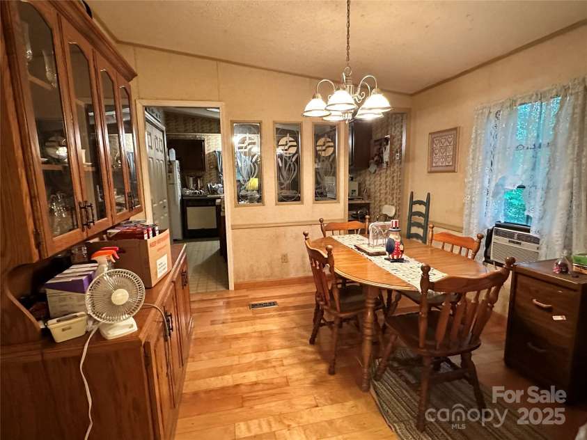 98 Long Pine Drive, Mills River, NC 28759.  MLS# CAR4264413, YatesRealty ID 16070. Dining Rm view from Living Rm.