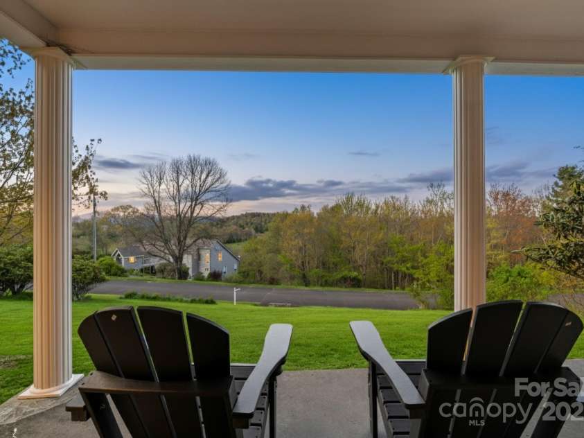 184 Buff Ridge Road, Boone, NC 28607.  MLS# CAR4301636, YatesRealty ID 16071. Sunset on the front porch