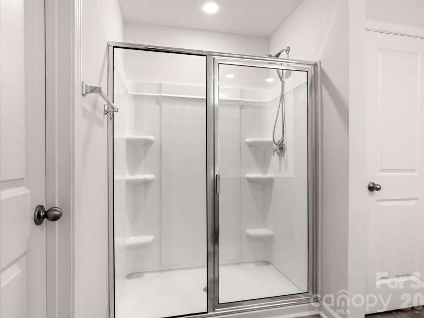 9142 Mackinaw Drive, Gastonia, NC 28056.  MLS# CAR4326705, YatesRealty ID 16071. Double stand up shower