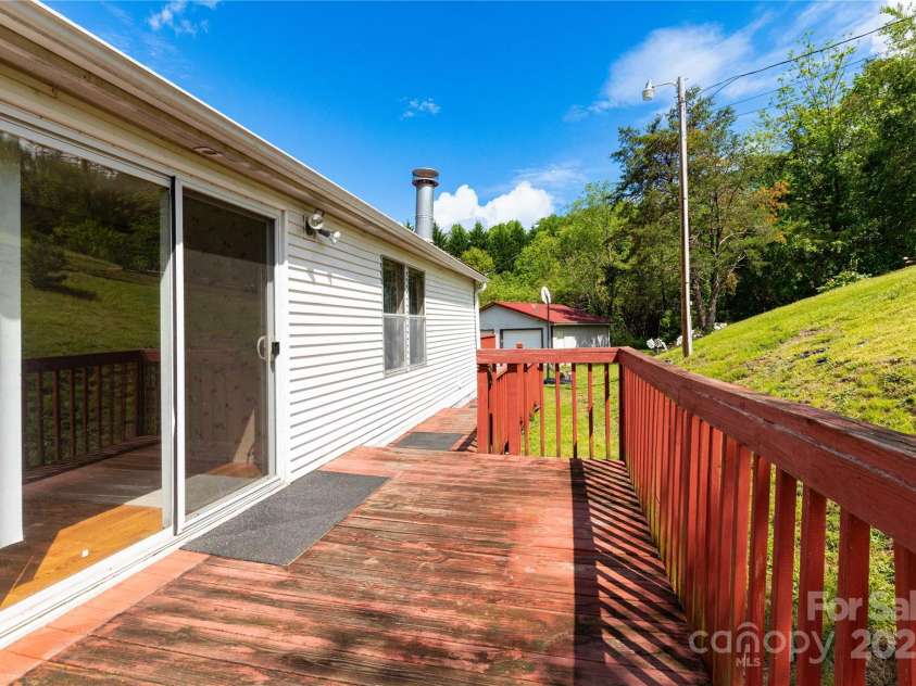 283 Grandview Drive, Marshall, NC 28753.  MLS# CAR4256159, YatesRealty ID 16074. Back deck