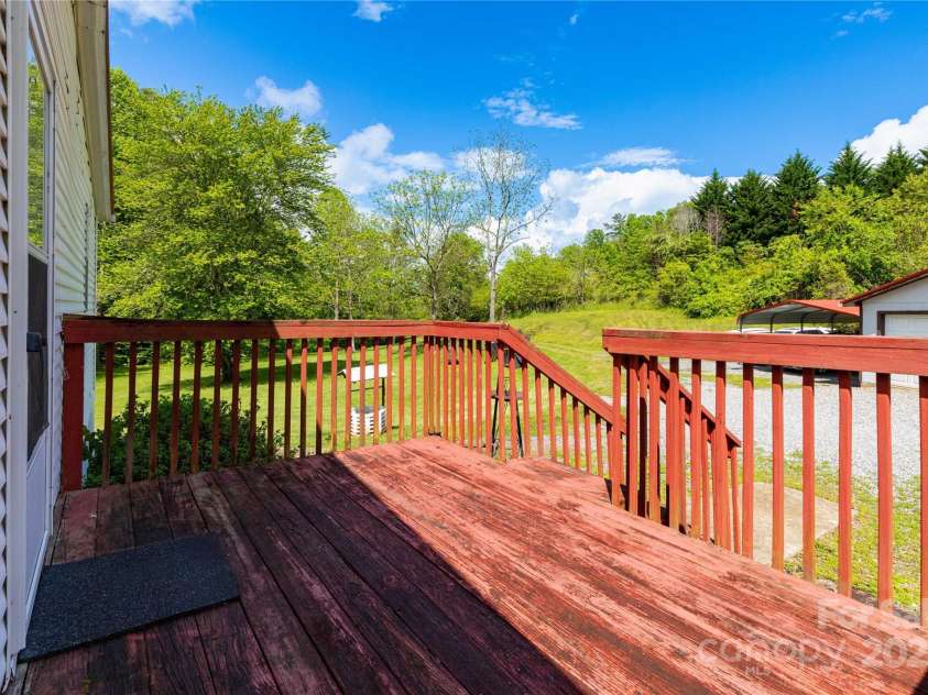 283 Grandview Drive, Marshall, NC 28753.  MLS# CAR4256159, YatesRealty ID 16074. Front deck