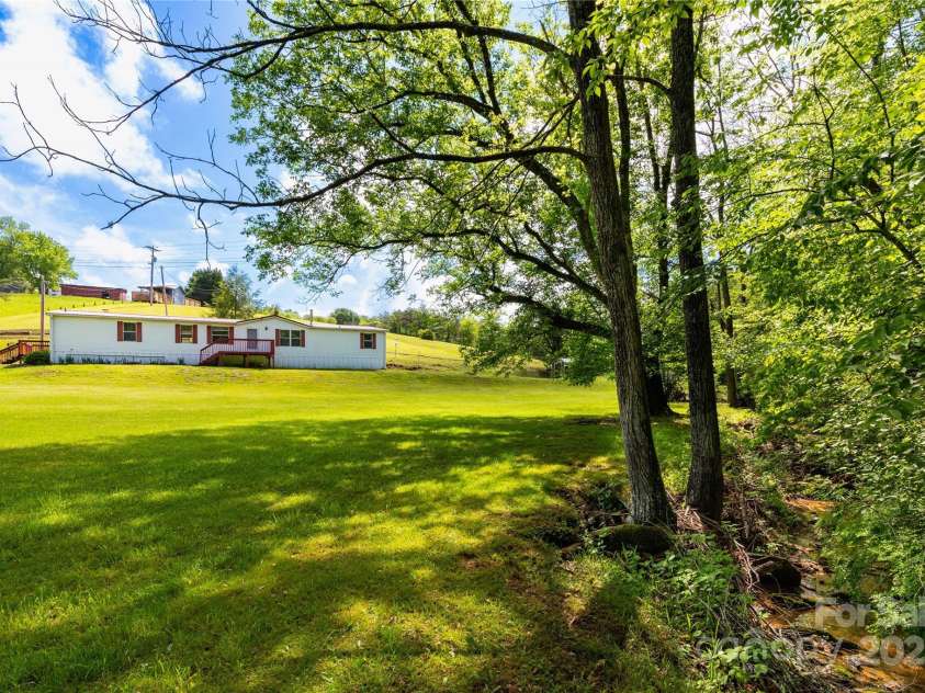 283 Grandview Drive, Marshall, NC 28753.  MLS# CAR4256159, YatesRealty ID 16074. View from corner of lot