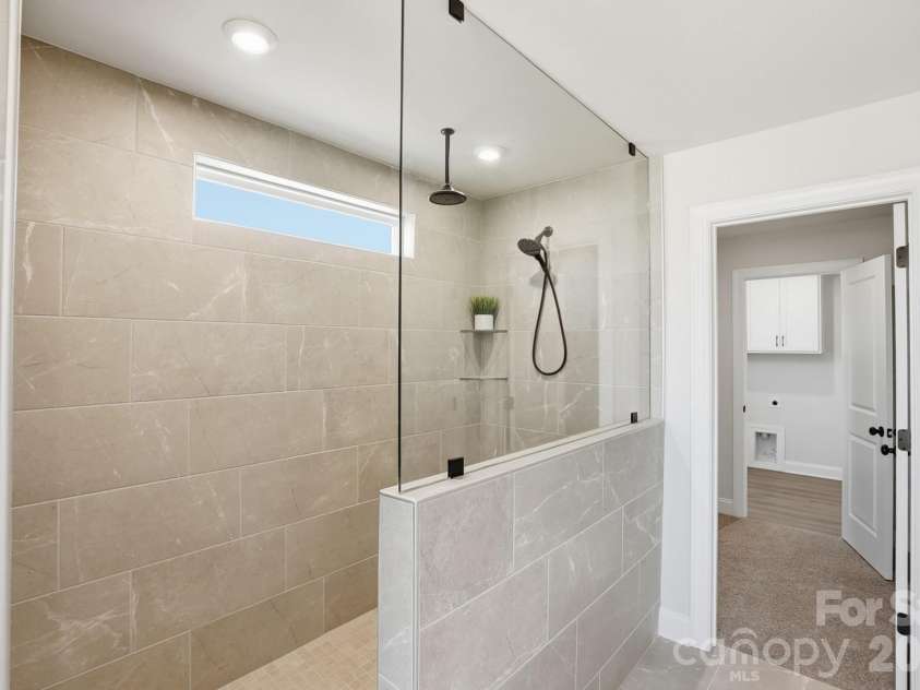 2608 Mabel Lane, Monroe, NC 28110.  MLS# CAR4315406, YatesRealty ID 16075. Spa Shower