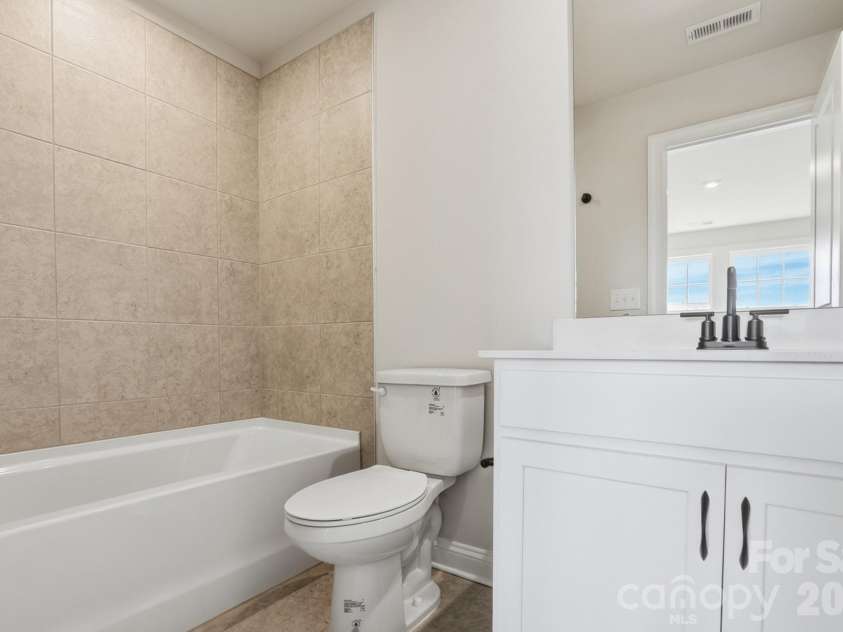 2608 Mabel Lane, Monroe, NC 28110.  MLS# CAR4315406, YatesRealty ID 16075. Upstairs En Suite Bath