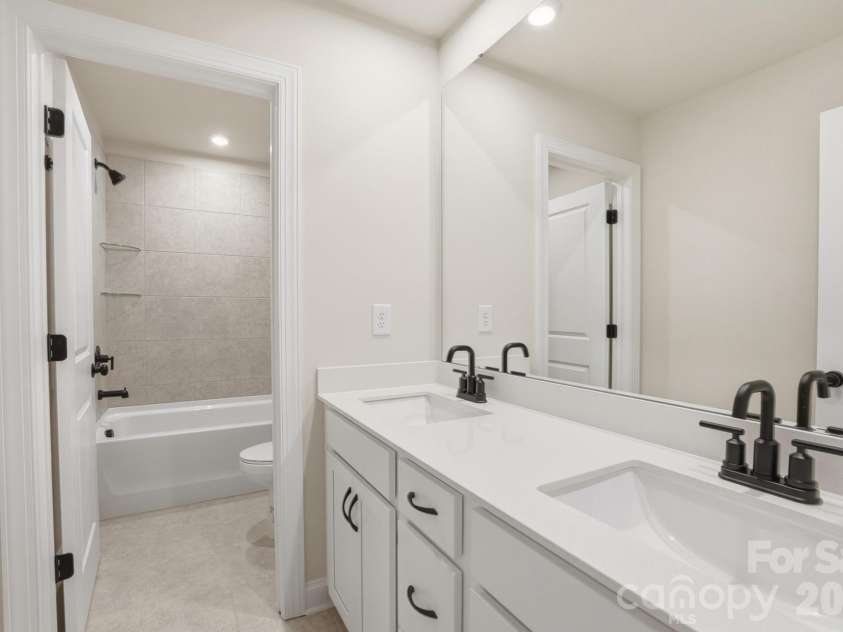 2608 Mabel Lane, Monroe, NC 28110.  MLS# CAR4315406, YatesRealty ID 16075. Upstairs Hall Bath