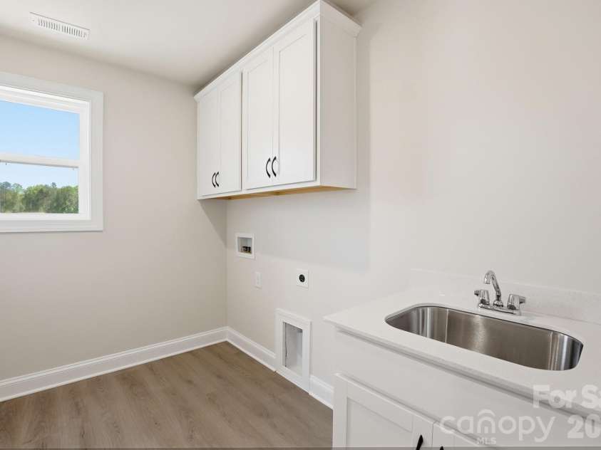 2608 Mabel Lane, Monroe, NC 28110.  MLS# CAR4315406, YatesRealty ID 16075. Upstairs Laundry