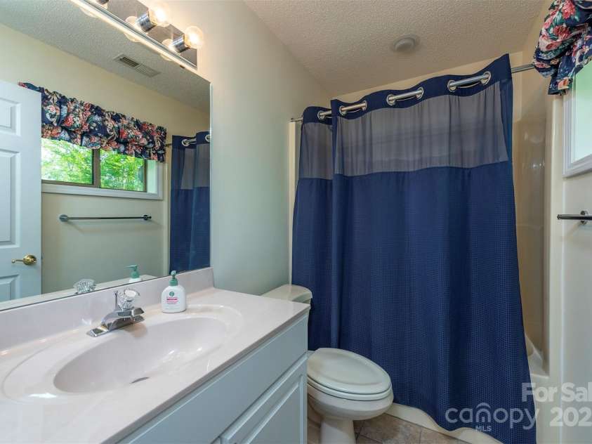 138 Estates Road, Lake Lure, NC 28746.  MLS# CAR4246790, YatesRealty ID 16076. 