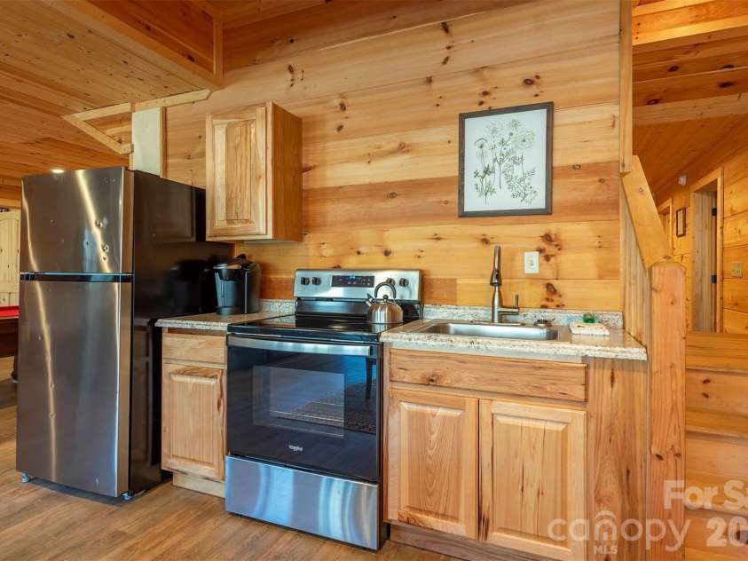 210 Fork Drive, Lake Lure, NC 28746.  MLS# CAR4359953, YatesRealty ID 16076. 