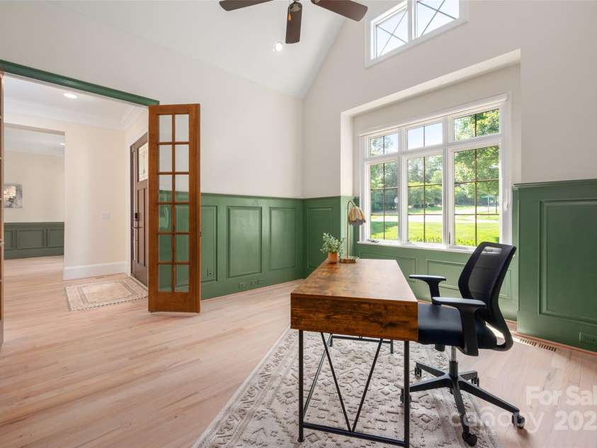 1500 Tarrington Way, Wesley Chapel, NC 28079.  MLS# CAR4260125, YatesRealty ID 16079. Formal office with vaulted ceiling and beautiful wood french doors