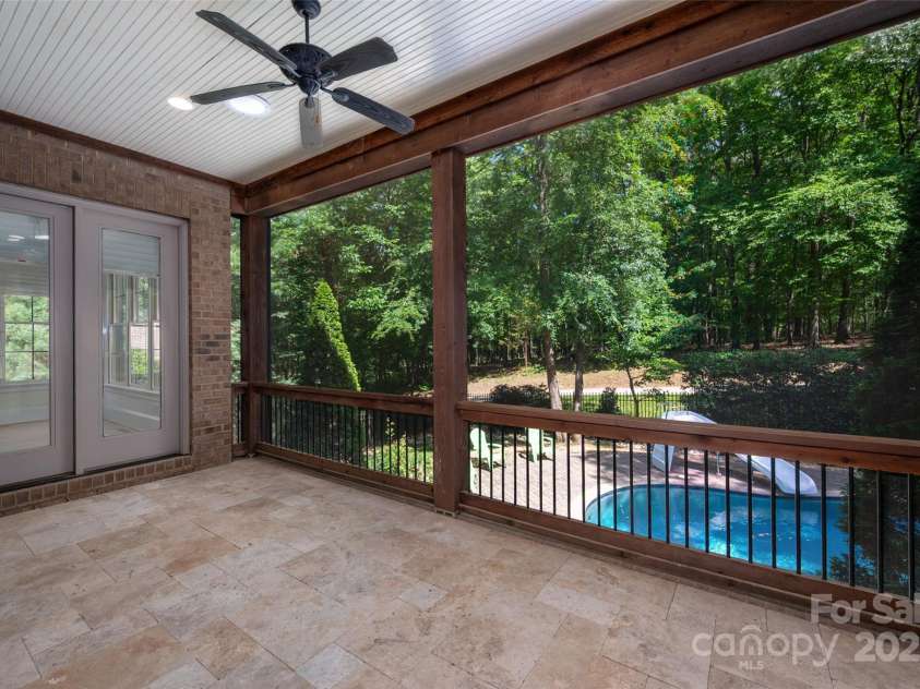 1500 Tarrington Way, Wesley Chapel, NC 28079.  MLS# CAR4260125, YatesRealty ID 16079. Rear deck with motorized screen giving you options.
