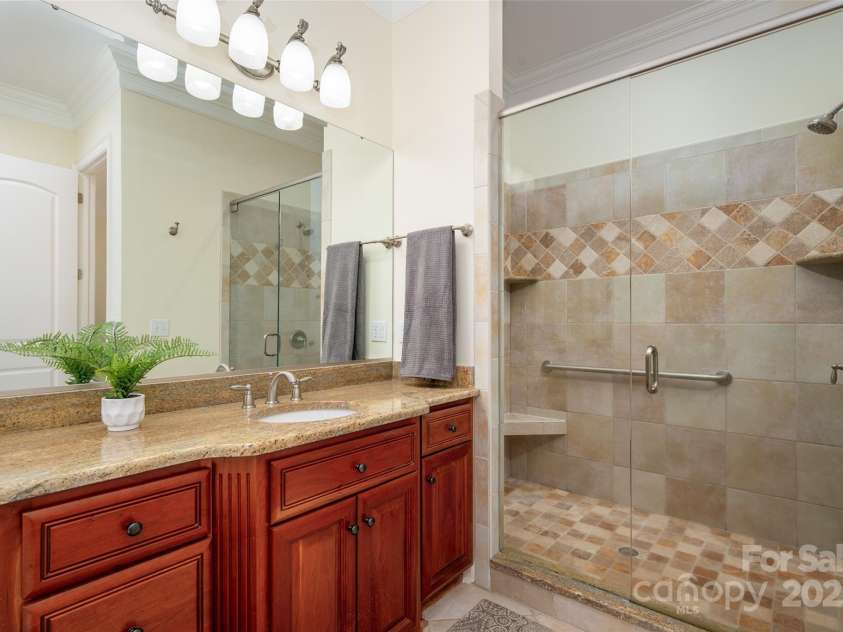 1500 Tarrington Way, Wesley Chapel, NC 28079.  MLS# CAR4260125, YatesRealty ID 16079. Spacious tiled shower in primar ensuite