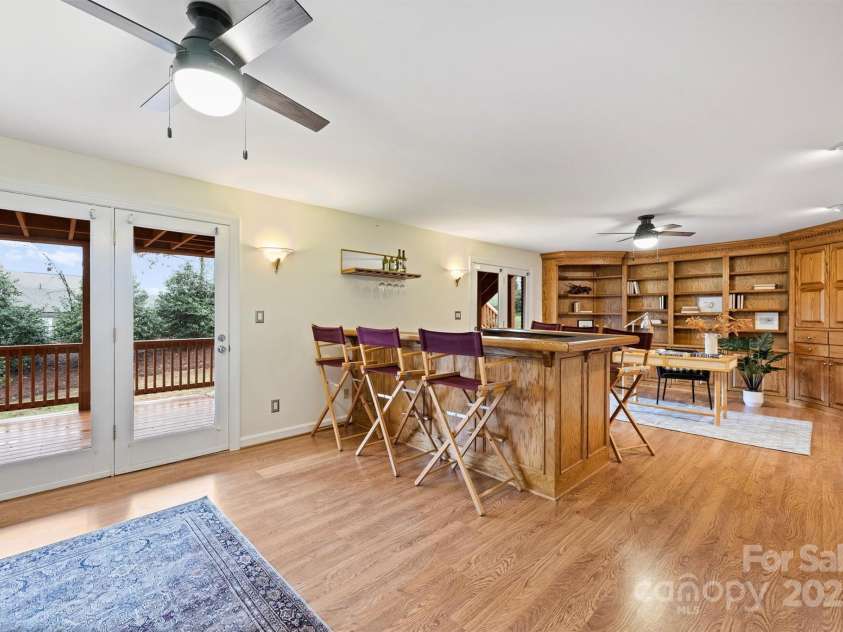 8000 Greencastle Drive, Charlotte, NC 28210.  MLS# CAR4223017, YatesRealty ID 16081. Basement Level - bar and built-ins