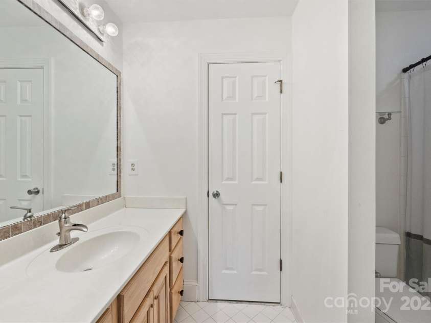 8000 Greencastle Drive, Charlotte, NC 28210.  MLS# CAR4223017, YatesRealty ID 16081. Bedroom 2 ensuite bathroom (walk-in closet)