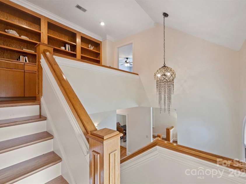 8000 Greencastle Drive, Charlotte, NC 28210.  MLS# CAR4223017, YatesRealty ID 16081. Stairwell and built-ins on 2nd Floor