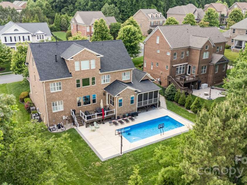 16109 Reynolds Drive, Indian Land, SC 29707.  MLS# CAR4255287, YatesRealty ID 16082. Backyard aerial view