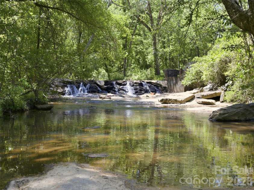 450 Washington Street, Forest City, NC 28043.  MLS# CAR4374908, YatesRealty ID 16082. Creek on additional parcel