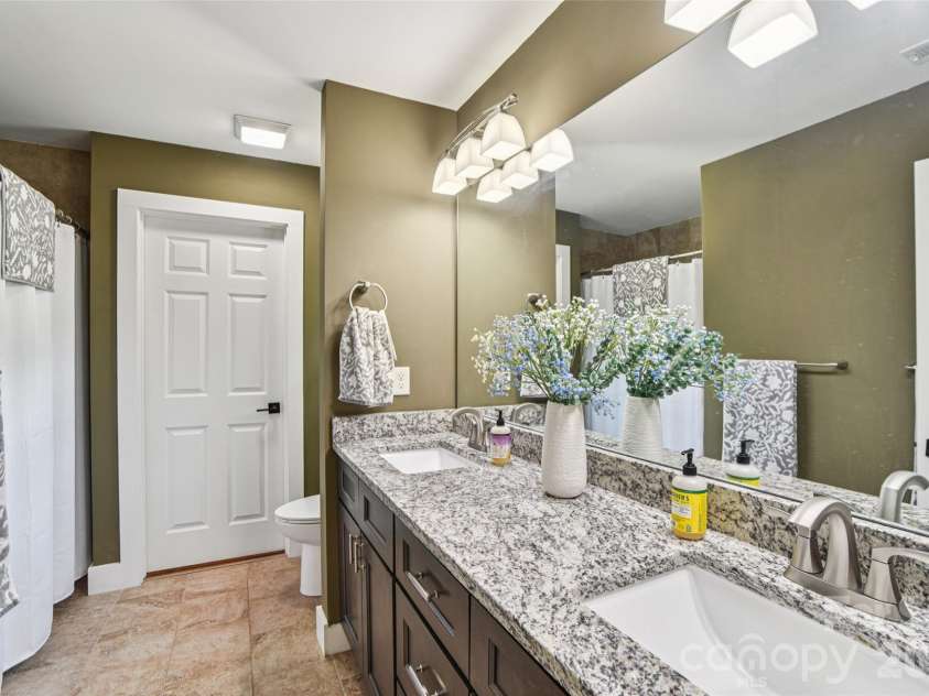 8 Apple Lane, Asheville, NC 28804.  MLS# CAR4354022, YatesRealty ID 16087. Elegant ceramic tile flooring in bathroom